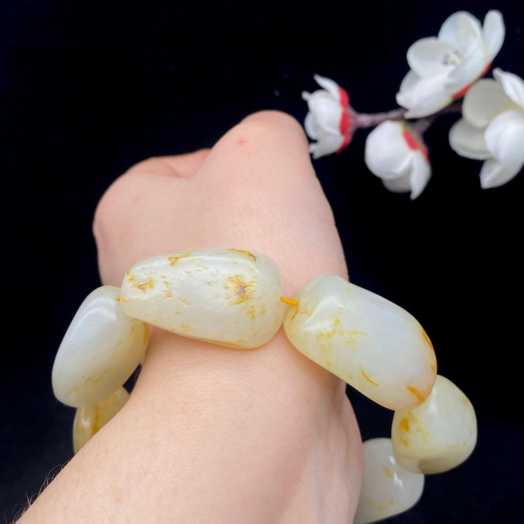 和田玉洒金皮籽料【精品手串】（84.6g）