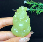 和田玉若羌黄口料财神（44.3g）