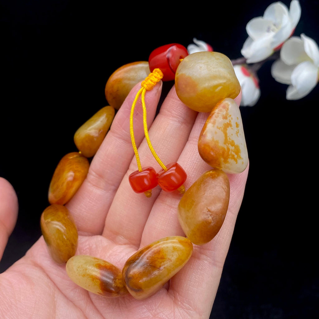 和田玉聚红皮籽料【精品手串】（70g）