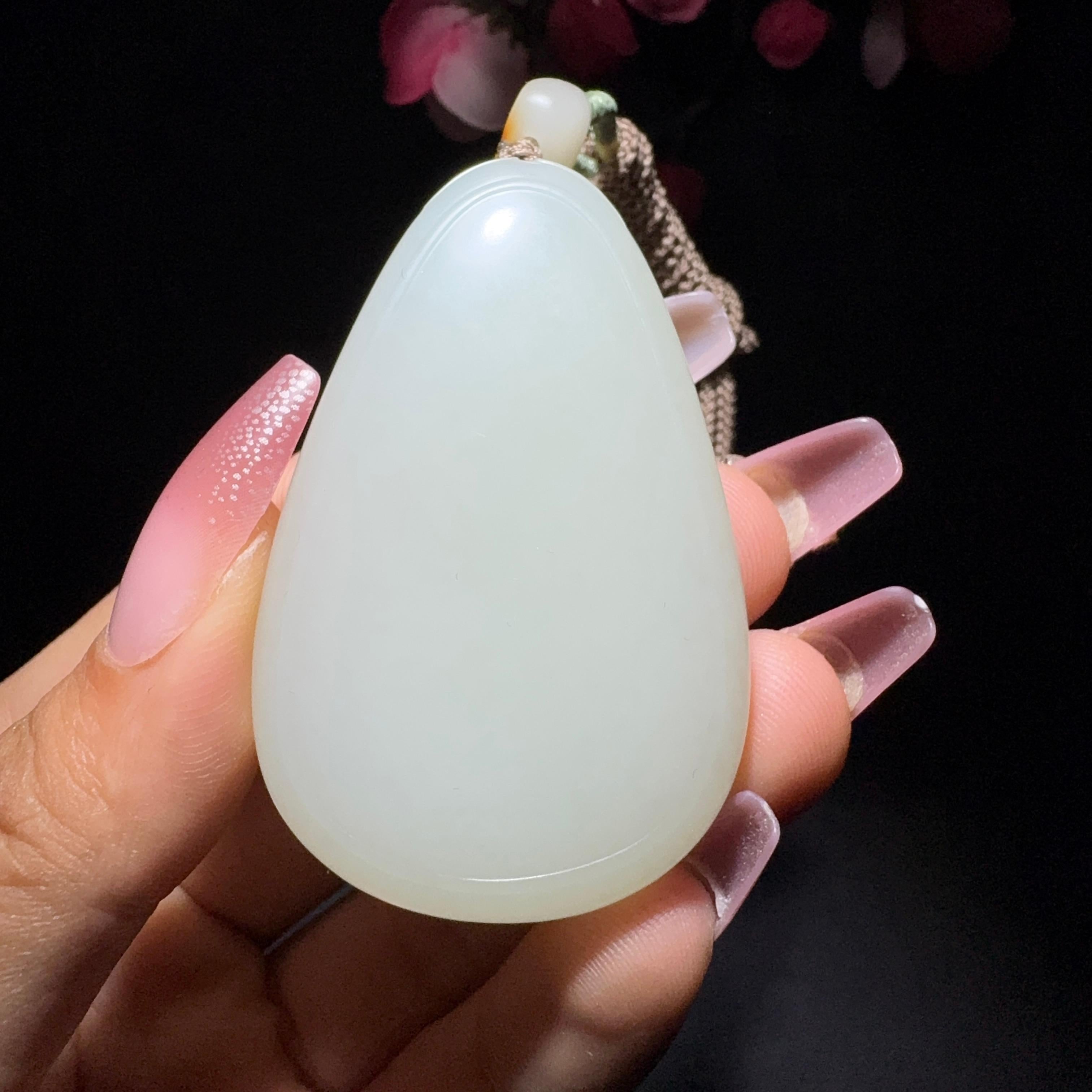 和田玉籽料平安牌挂件（47.2g）