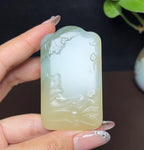 新疆和田玉且末糖白羊脂玉带翠文殊菩萨（59.3g）