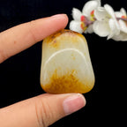 和田玉聚黄皮籽料挂件（42.7g）