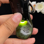 和田玉沙枣青带秋梨皮籽料手把件（74.7g）