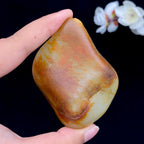 和田玉聚红皮籽料手把件（158.9g）