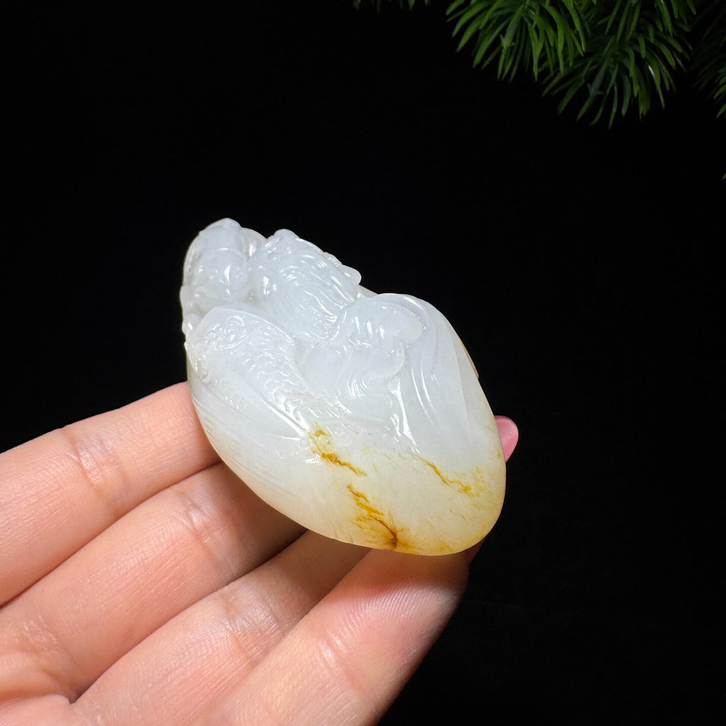 和田玉籽料黄皮关公（100.0g）