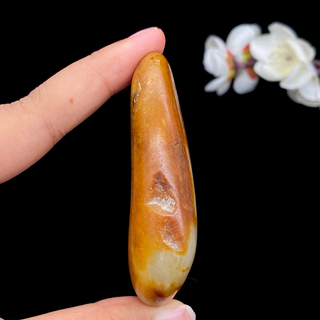 和田玉聚黄皮籽料手把件（75.1g）