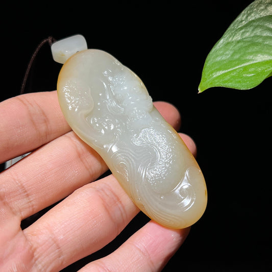 和田玉籽料洒金皮龙挂件（47.2g）