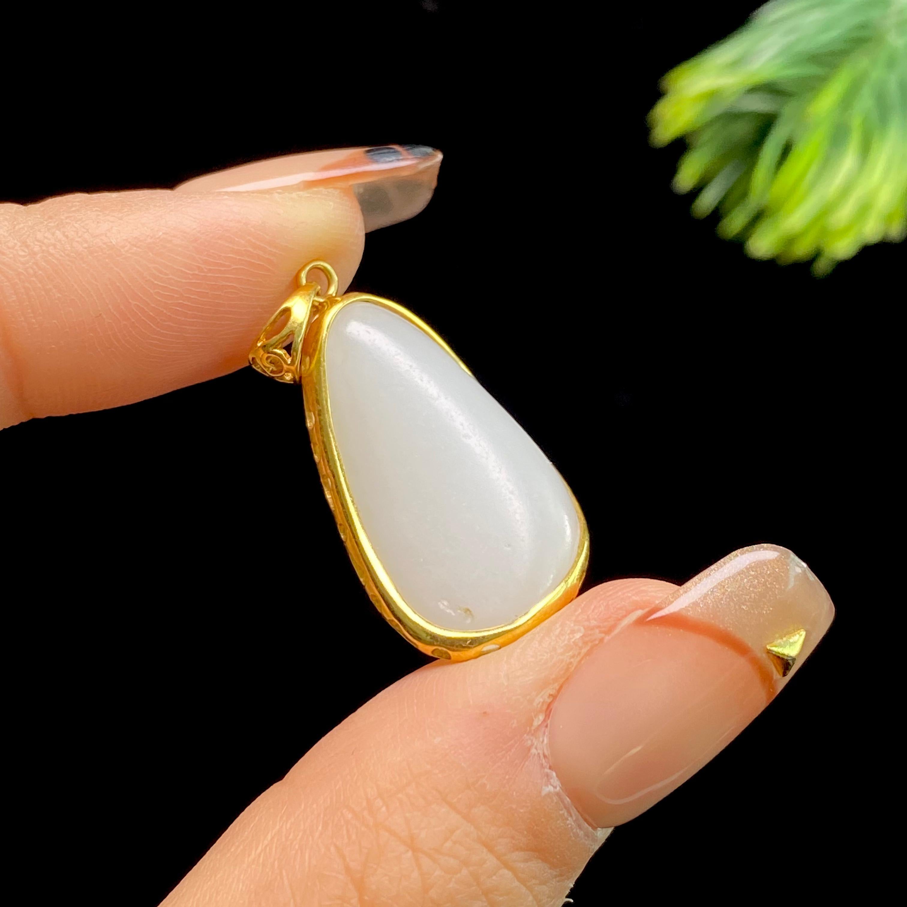 和田玉18k镶金籽料吊坠（5.2g）