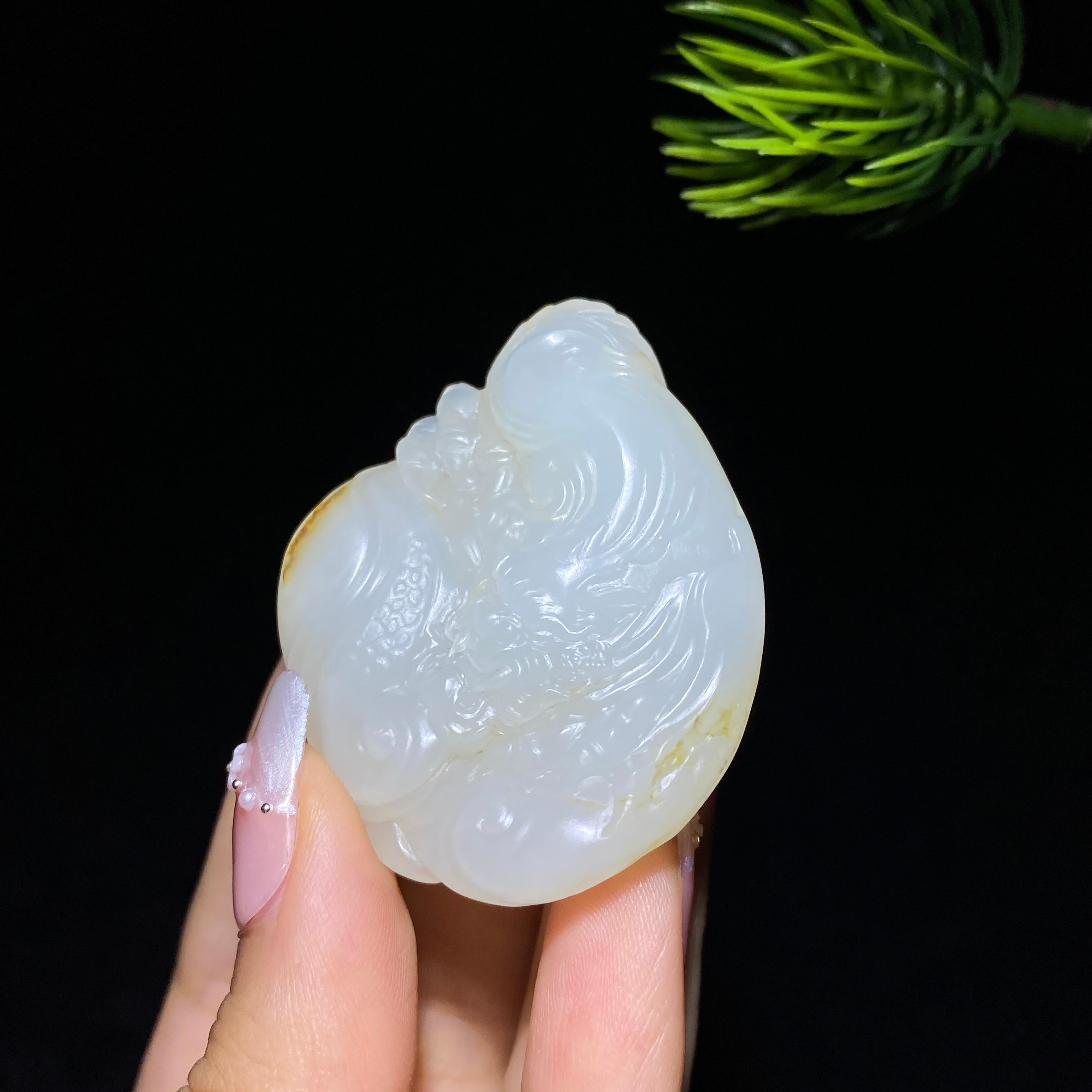 和田玉籽料龙行天下（34.3g）