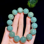 和田玉籽料沙枣青圆珠手串（89.9g）