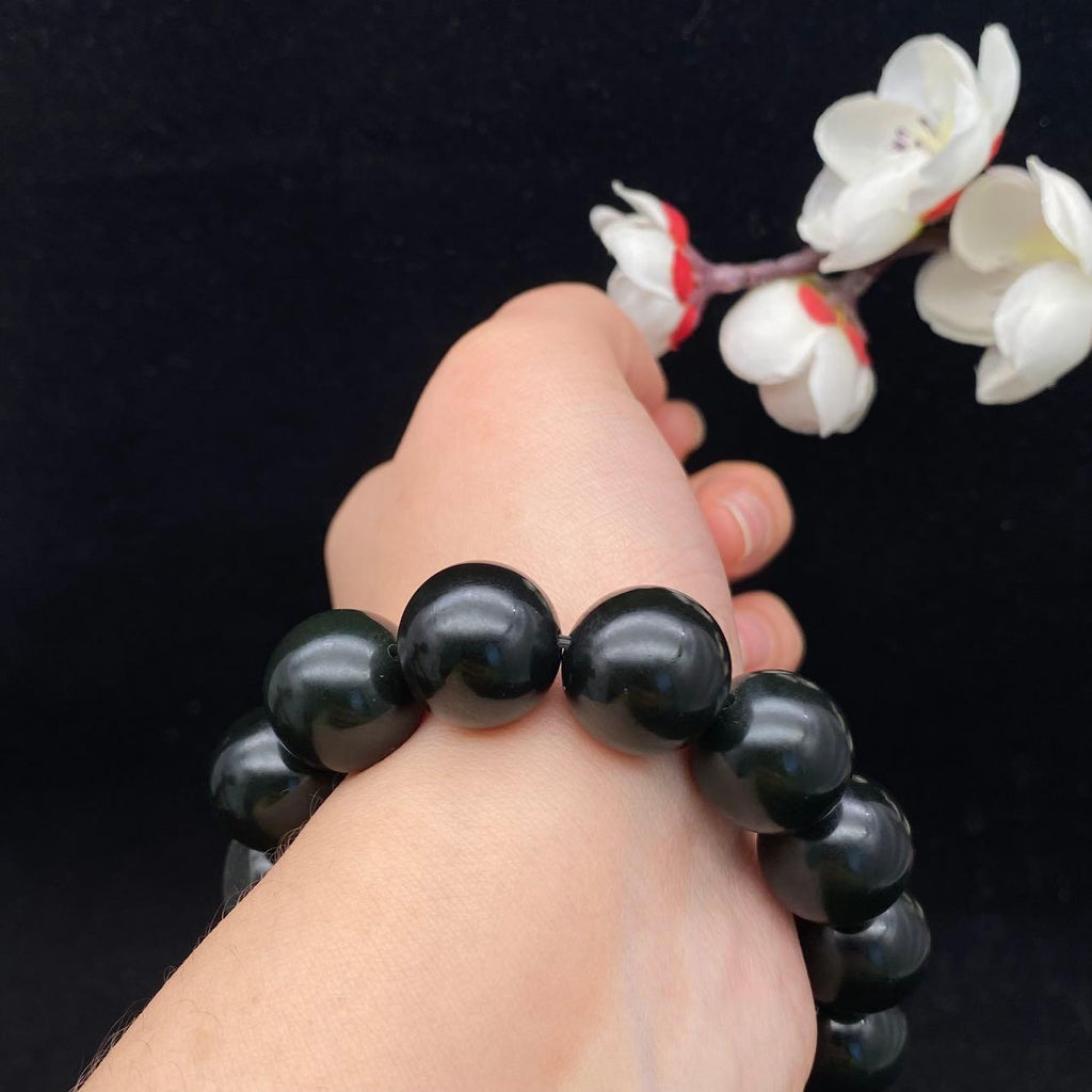 和田玉黑青籽料【圆珠手串】（74.5g）