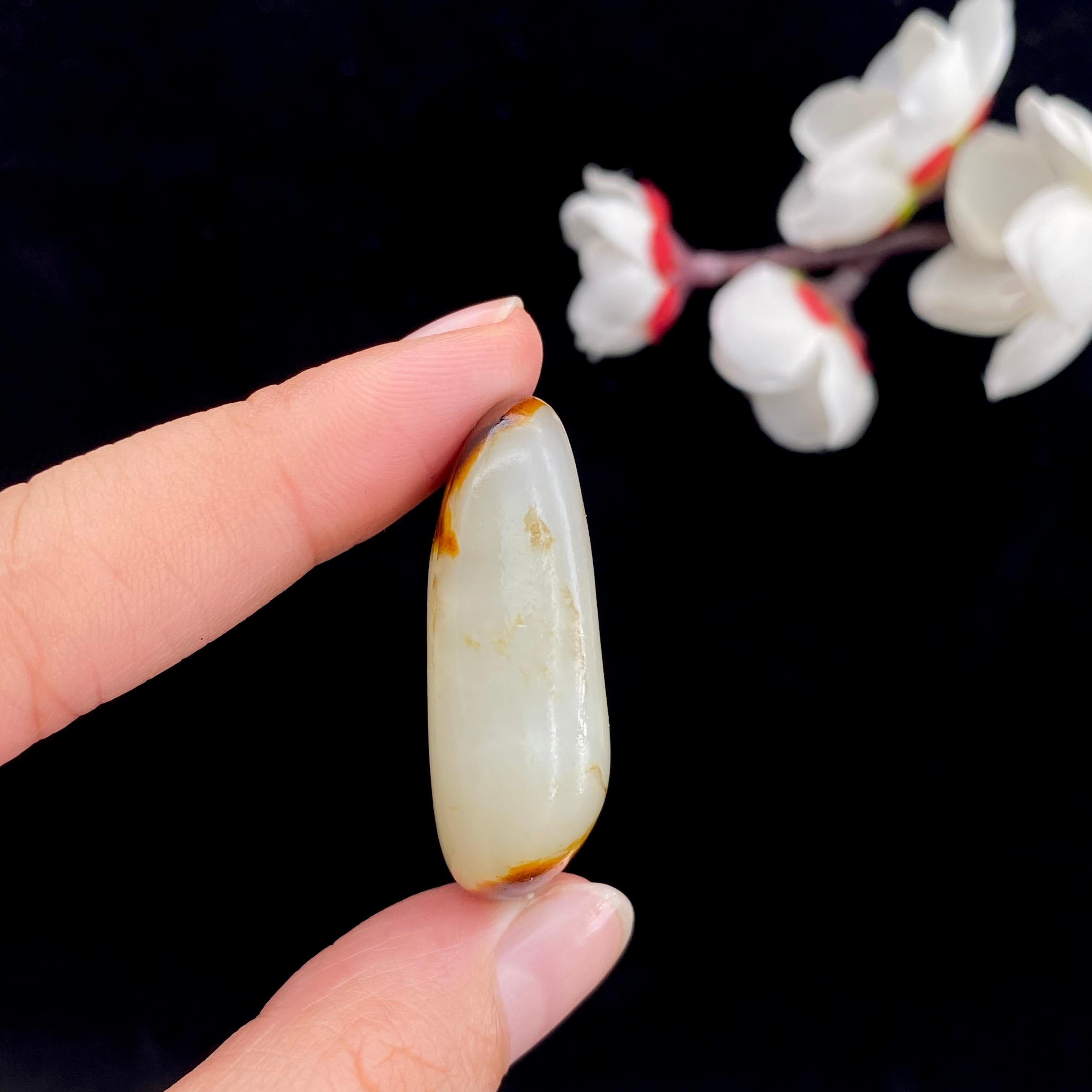 和田玉聚红皮籽料原石（20.2g）